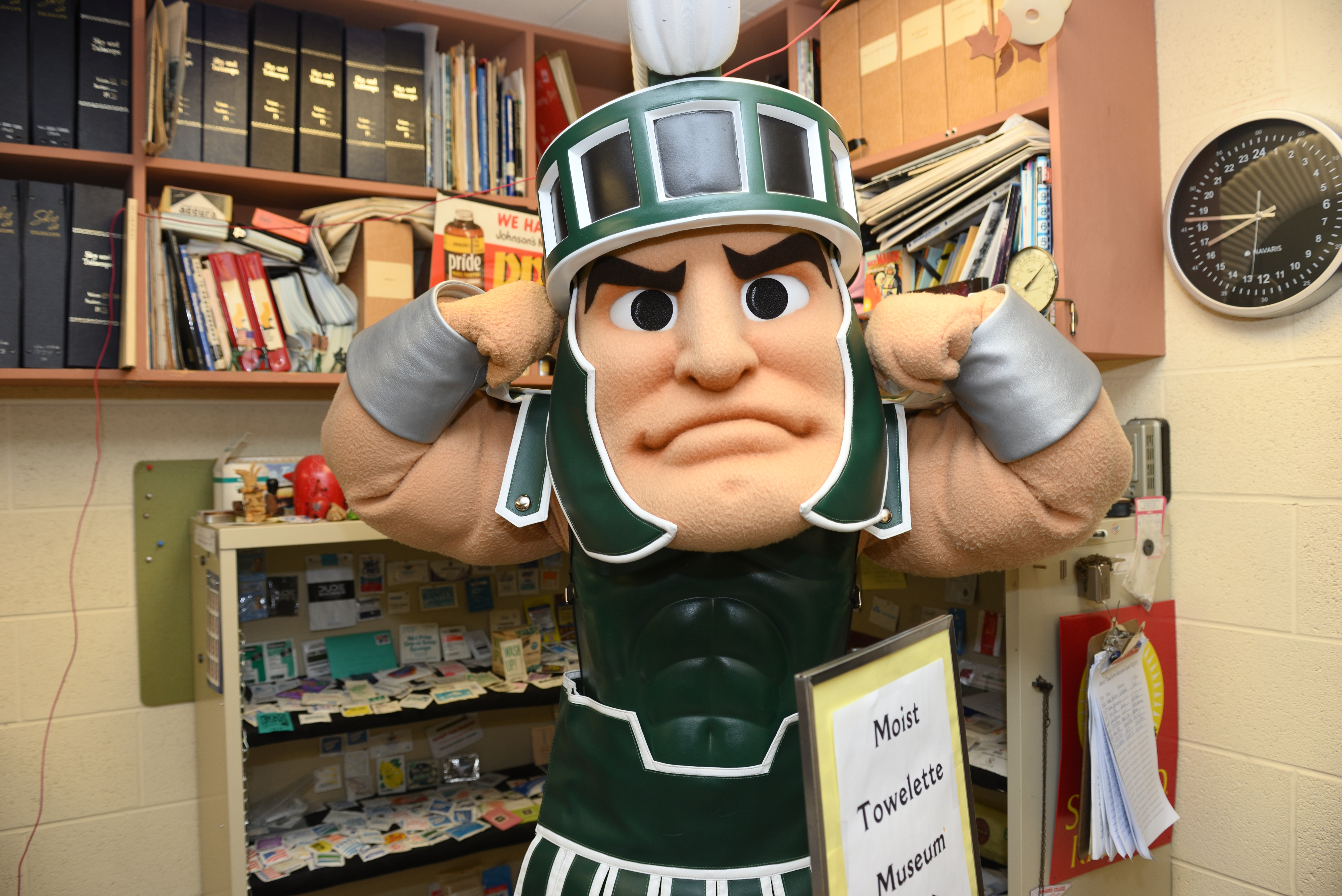 Sparty mascot stands in front of the Moist Towelette Museum
